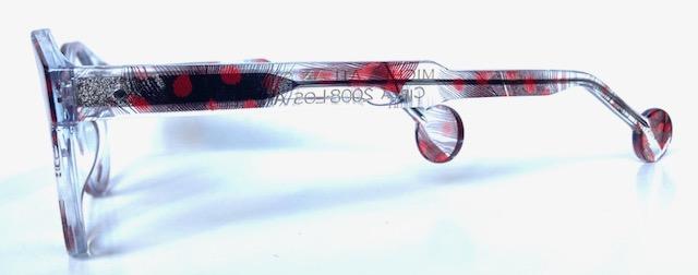 TRISTAN RED FEATHER